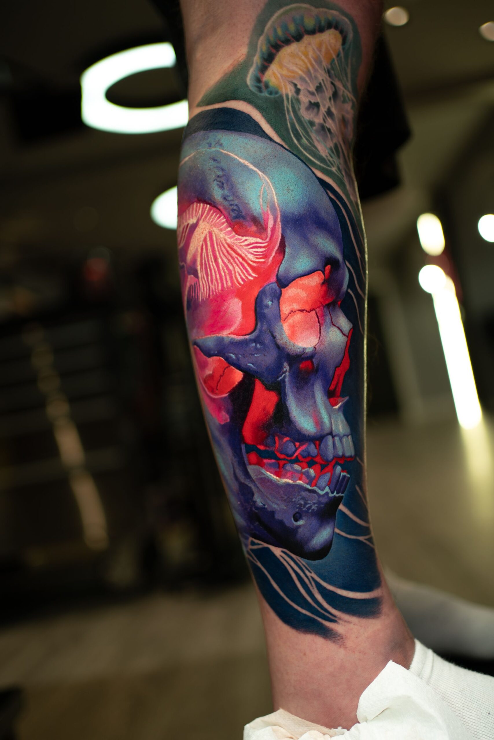 Rich Harris — blue skull with neon accents